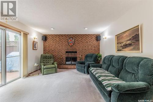 1 Calypso Drive, Moose Jaw, SK - Indoor Photo Showing Living Room With Fireplace