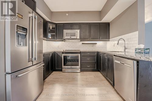 509 - 304 Essa Road, Barrie (400 East), ON - Indoor Photo Showing Kitchen With Stainless Steel Kitchen With Upgraded Kitchen