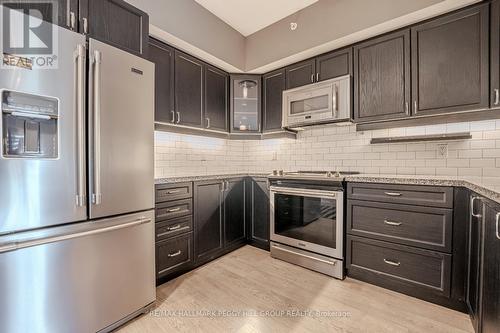 509 - 304 Essa Road, Barrie (400 East), ON - Indoor Photo Showing Kitchen With Stainless Steel Kitchen With Upgraded Kitchen