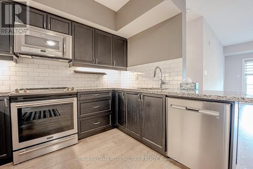 509 - 304 Essa Road, Barrie (400 East), ON - Indoor Photo Showing Kitchen With Upgraded Kitchen