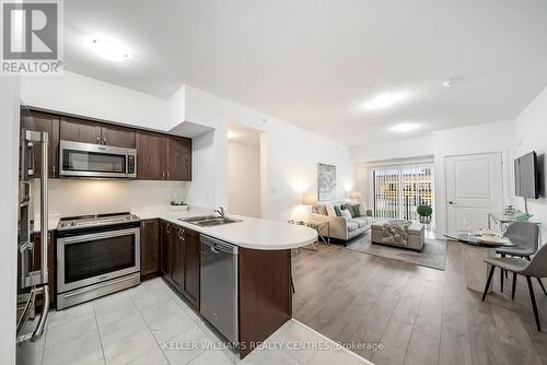 106 - 295 Cundles Road E, Barrie, ON - Indoor Photo Showing Kitchen With Stainless Steel Kitchen With Double Sink