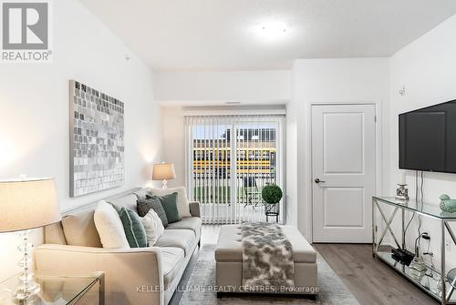 106 - 295 Cundles Road E, Barrie, ON - Indoor Photo Showing Living Room