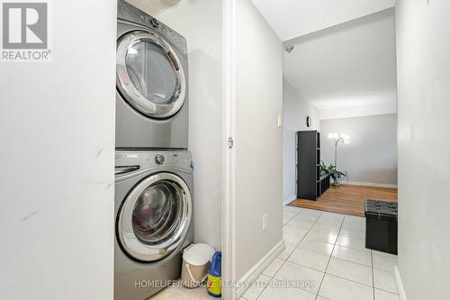 403 - 10 Markbrook Lane, Toronto (Mount Olive-Silverstone-Jamestown), ON - Indoor Photo Showing Laundry Room