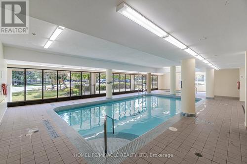 403 - 10 Markbrook Lane, Toronto (Mount Olive-Silverstone-Jamestown), ON - Indoor Photo Showing Other Room With In Ground Pool