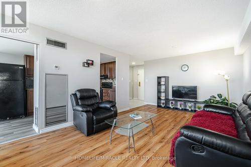 403 - 10 Markbrook Lane, Toronto (Mount Olive-Silverstone-Jamestown), ON - Indoor Photo Showing Living Room