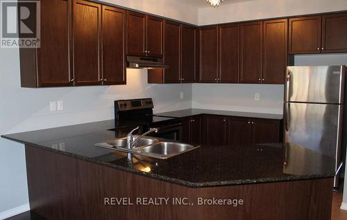 51 - 745 Farmstead Drive, Milton, ON - Indoor Photo Showing Kitchen With Double Sink