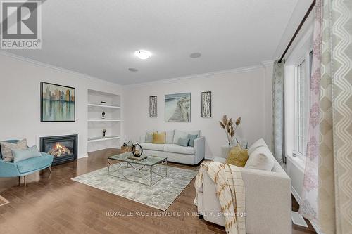 21 Borrelli Drive, Brampton (Credit Valley), ON - Indoor Photo Showing Living Room With Fireplace