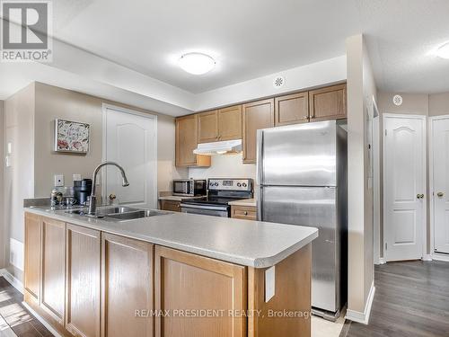 1 - 129 Isaac Devins Boulevard, Toronto (Humberlea-Pelmo Park), ON - Indoor Photo Showing Kitchen With Double Sink