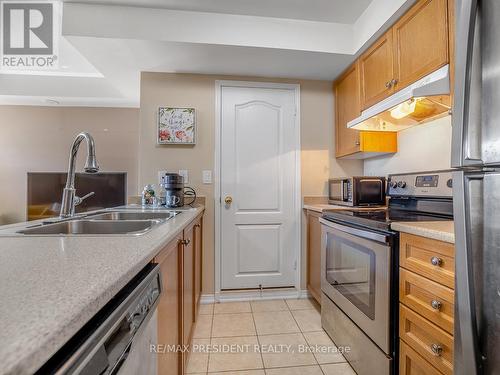 1 - 129 Isaac Devins Boulevard, Toronto (Humberlea-Pelmo Park), ON - Indoor Photo Showing Kitchen With Double Sink