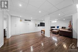 Basement Den with built in cupboards is another great spot to seperate work from life. - 