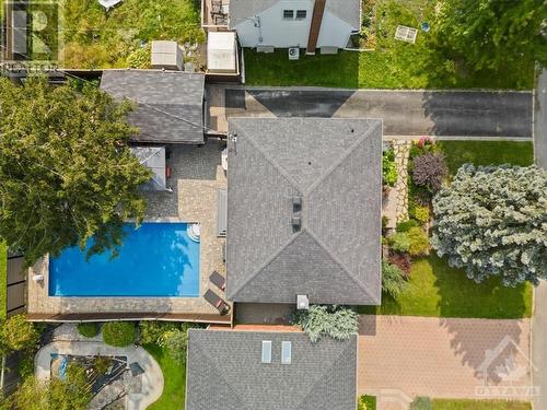 The basement bathroom includes heated floors. - 1605 Digby Street, Ottawa, ON - Outdoor With In Ground Pool