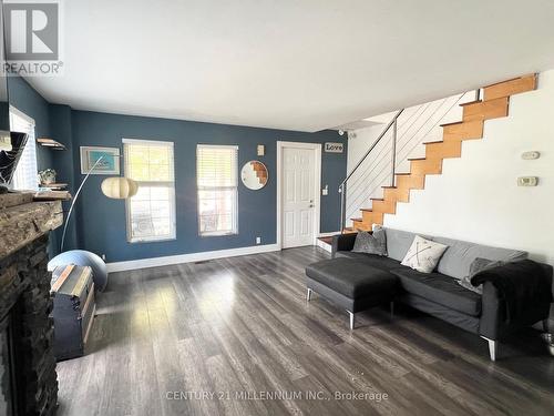 22 Market Street, Collingwood, ON - Indoor Photo Showing Living Room With Fireplace