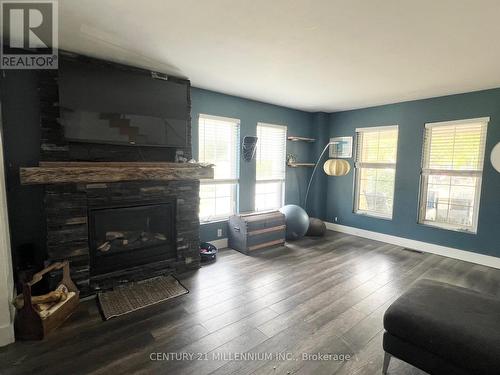 22 Market Street, Collingwood, ON - Indoor Photo Showing Living Room With Fireplace