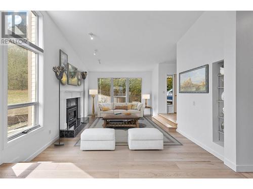 1837 Olympus Way, West Kelowna, BC - Indoor Photo Showing Living Room With Fireplace