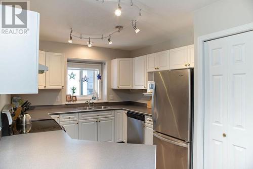 416 Beasley  W Crescent, Nelson, BC - Indoor Photo Showing Kitchen With Double Sink