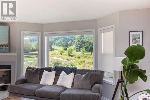 416 Beasley  W Crescent, Nelson, BC - Indoor Photo Showing Living Room With Fireplace