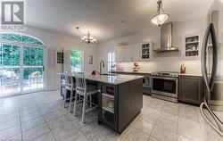 Bright spacious kitchen with sliders out to deck - 