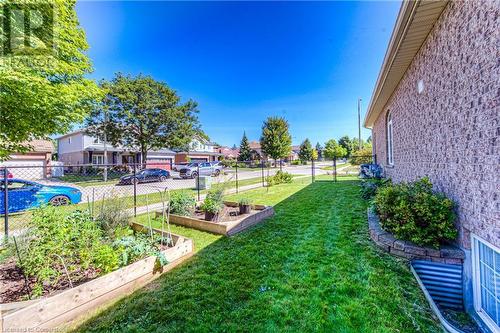 Side yard garden beds - 89 Hearthwood Crescent, Kitchener, ON - Outdoor