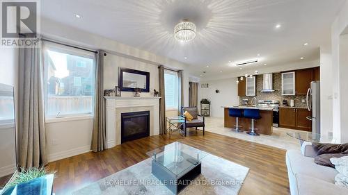 523 Halo Street, Oshawa (Windfields), ON - Indoor Photo Showing Living Room With Fireplace