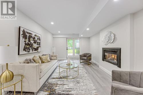 48 Walnut Street, New Tecumseth, ON - Indoor Photo Showing Living Room With Fireplace