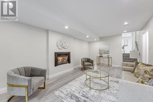 48 Walnut Street, New Tecumseth, ON - Indoor Photo Showing Living Room With Fireplace