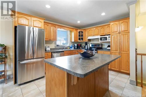 18 Heathwood Street, Moncton, NB - Indoor Photo Showing Kitchen With Double Sink