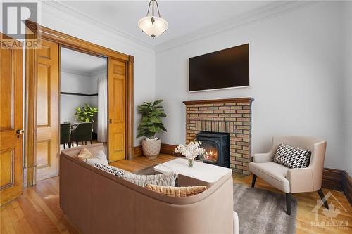 27 & 29 Third Avenue, Ottawa, ON - Indoor Photo Showing Living Room With Fireplace