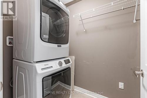 904 - 330 Ridout Street N, London, ON - Indoor Photo Showing Laundry Room