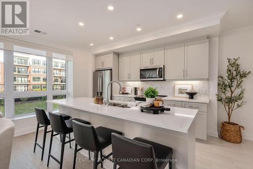 111 - 1560 Upper West Avenue, London, ON - Indoor Photo Showing Kitchen With Stainless Steel Kitchen With Upgraded Kitchen