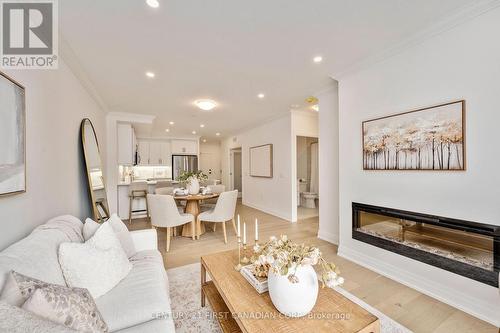 Open Concept floorplan - 109 - 1560 Upper West Avenue, London, ON - Indoor Photo Showing Living Room With Fireplace