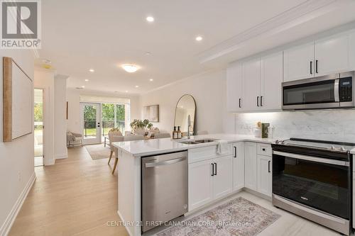 109 - 1560 Upper West Avenue, London, ON - Indoor Photo Showing Kitchen With Double Sink With Upgraded Kitchen