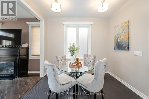 28 Benadir Avenue, Caledon, ON - Indoor Photo Showing Dining Room With Fireplace