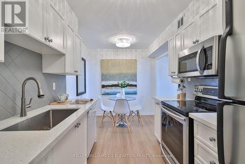 1203 - 511 The West Mall, Toronto (Etobicoke West Mall), ON - Indoor Photo Showing Kitchen With Upgraded Kitchen