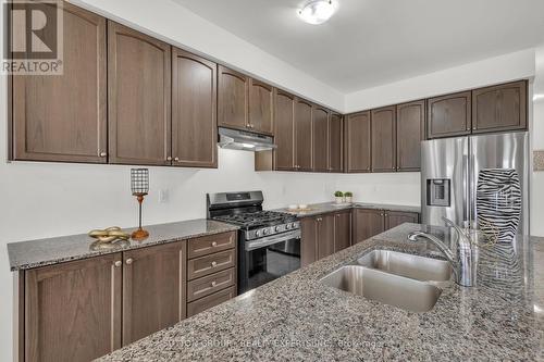 27 Brixham Lane, Brampton, ON - Indoor Photo Showing Kitchen With Stainless Steel Kitchen With Double Sink With Upgraded Kitchen