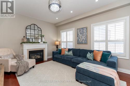 48 Amboise Crescent, Brampton (Fletcher'S Meadow), ON - Indoor Photo Showing Living Room With Fireplace