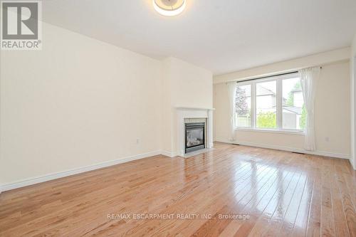 109 Wills Crescent, Hamilton (Binbrook), ON - Indoor Photo Showing Living Room With Fireplace