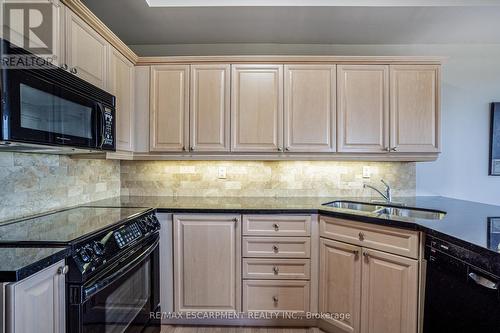 704 - 1770 Main Street W, Hamilton (Ainslie Wood), ON - Indoor Photo Showing Kitchen With Double Sink