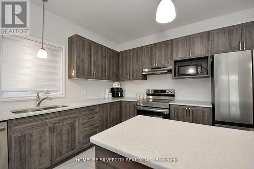 166 Savannah Ridge Drive, Brant (Paris), ON - Indoor Photo Showing Kitchen With Double Sink