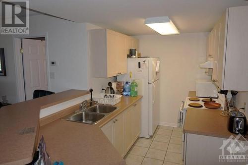 310 Central Park Drive Unit#9D, Ottawa, ON - Indoor Photo Showing Kitchen With Double Sink