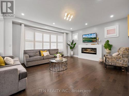 1406 Lawson Street, Innisfil, ON - Indoor Photo Showing Living Room With Fireplace