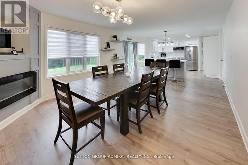 11 Club Court, Wasaga Beach, ON - Indoor Photo Showing Dining Room With Fireplace