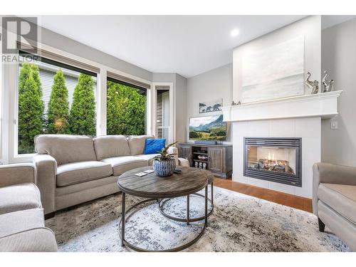 10395 Copperhill Lane, Lake Country, BC - Indoor Photo Showing Living Room With Fireplace