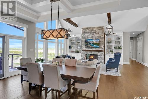 Chobanik Acreage, Lumsden Rm No. 189, SK - Indoor Photo Showing Dining Room With Fireplace