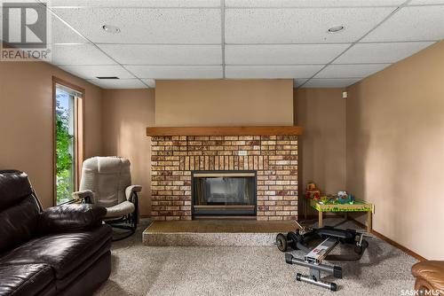 8123 Kestral Drive, Regina, SK - Indoor Photo Showing Living Room With Fireplace