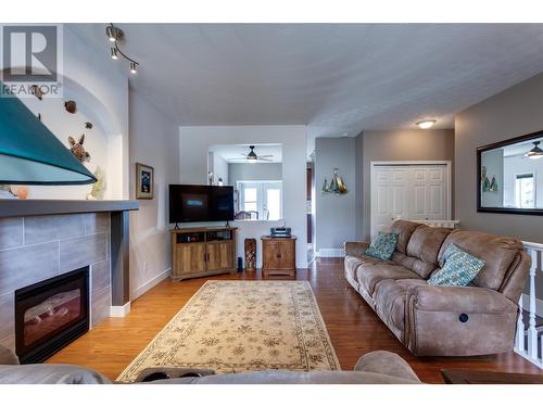 4450 Postill Drive Unit# 22, Kelowna, BC - Indoor Photo Showing Living Room With Fireplace