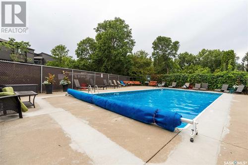 128 Quincy Drive, Regina, SK - Outdoor With In Ground Pool