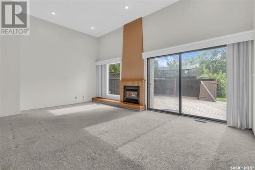 128 Quincy Drive, Regina, SK - Indoor With Fireplace