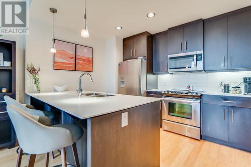 2040 Springfield Road Unit# 410, Kelowna, BC - Indoor Photo Showing Kitchen With Stainless Steel Kitchen With Double Sink With Upgraded Kitchen