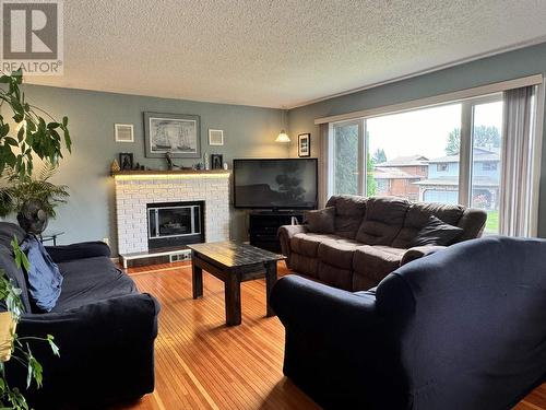 4818 Soucie Avenue, Terrace, BC - Indoor Photo Showing Living Room With Fireplace