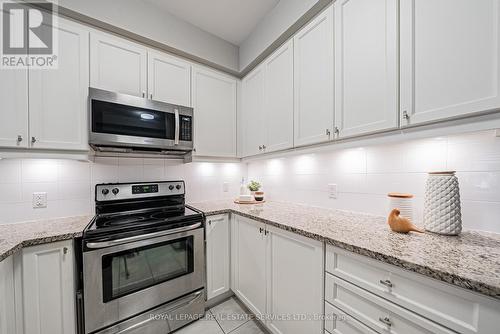 228 - 216 Oak Park Boulevard, Oakville, ON - Indoor Photo Showing Kitchen With Upgraded Kitchen